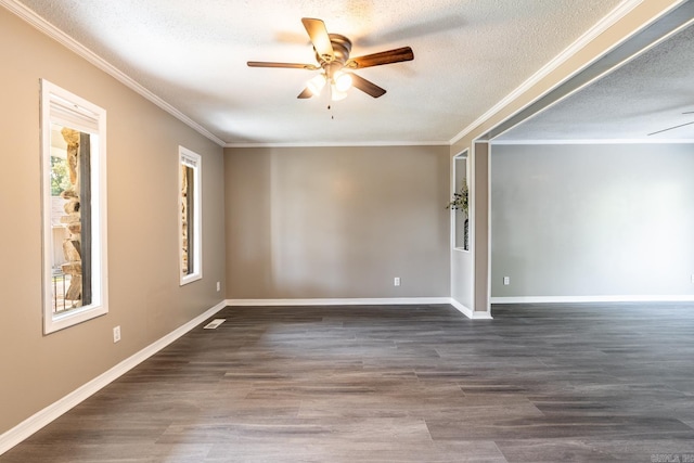 spare room featuring a textured ceiling, ceiling fan, dark hardwood / wood-style flooring, and crown molding