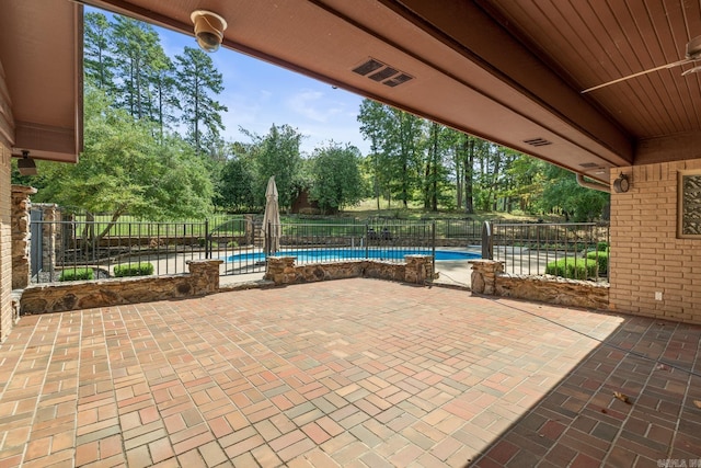 view of patio with a community pool