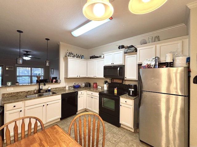 kitchen featuring pendant lighting, black appliances, sink, ceiling fan, and light tile patterned flooring