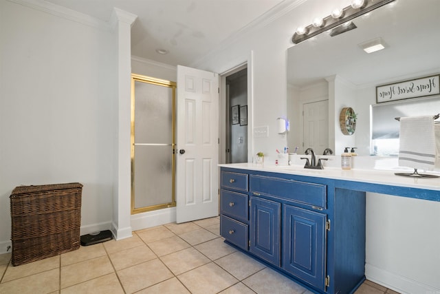 bathroom featuring tile patterned floors, vanity, ornamental molding, and walk in shower