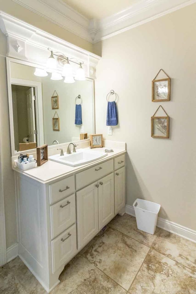 bathroom featuring vanity and ornamental molding