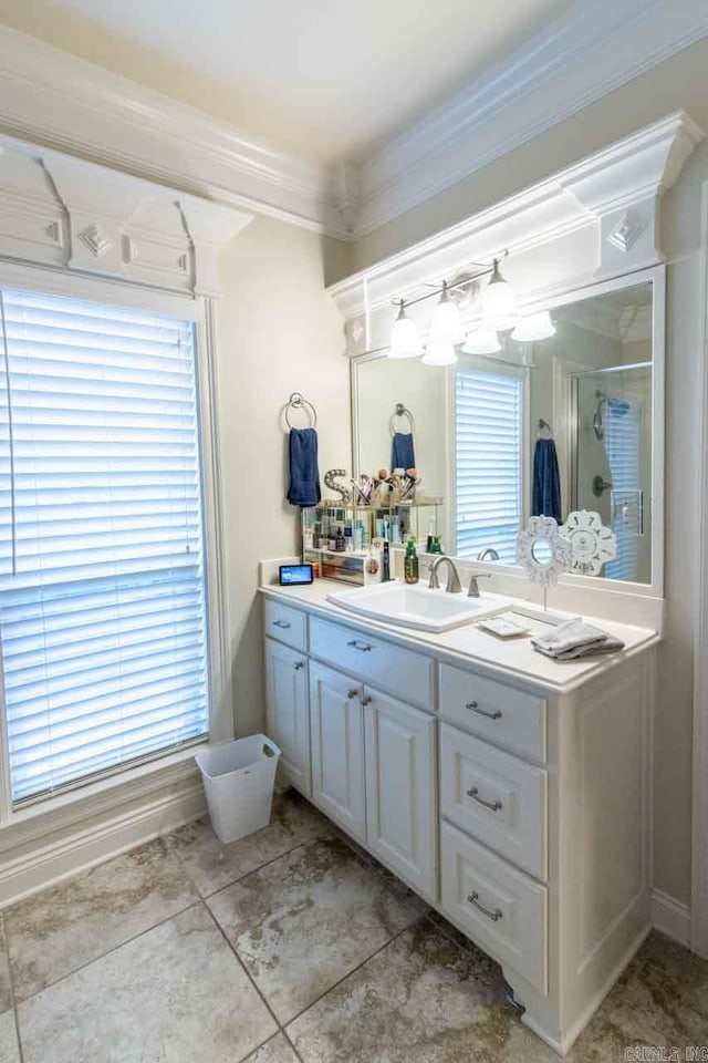 bathroom with vanity and a shower with door