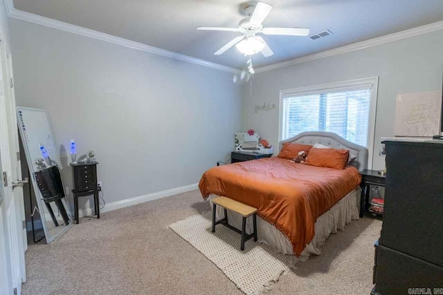 bedroom featuring light carpet, ceiling fan, and crown molding