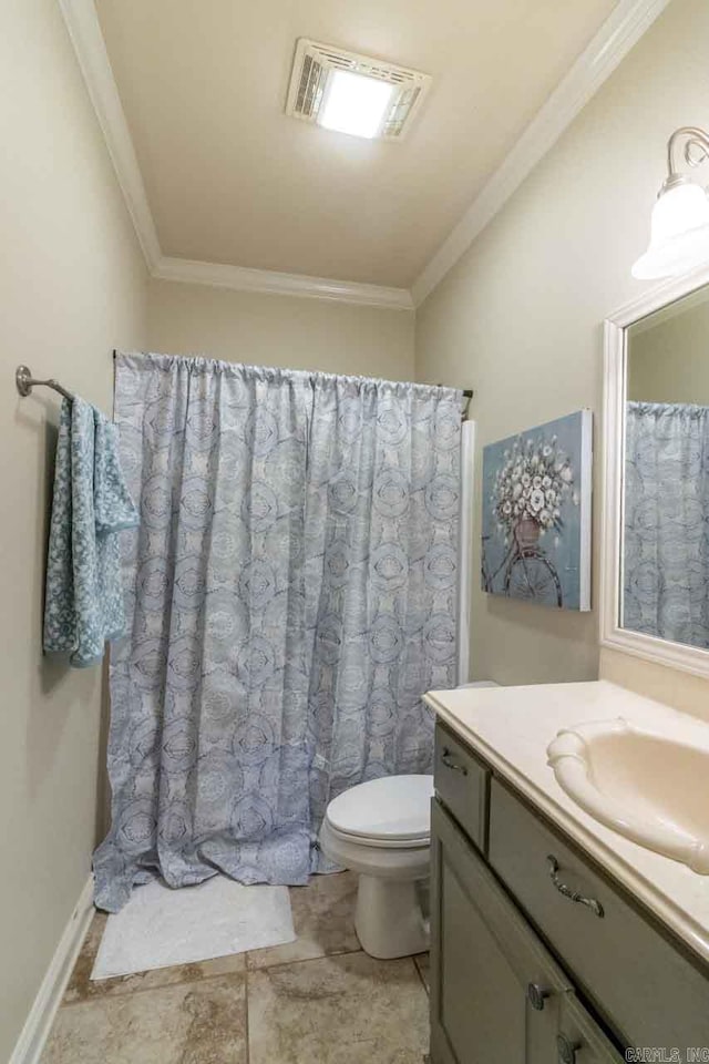 bathroom featuring vanity, toilet, and ornamental molding