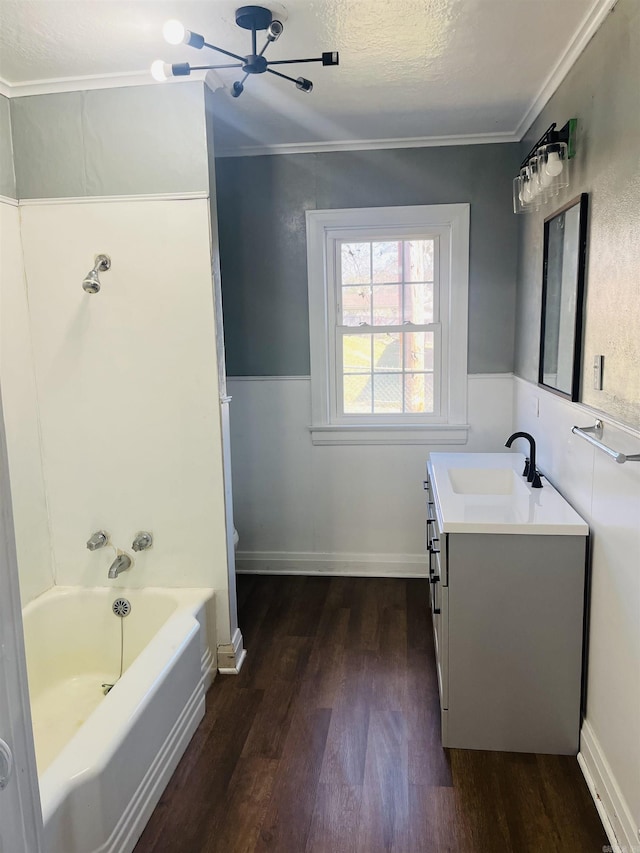 full bathroom featuring shower / bath combination, a textured ceiling, vanity, hardwood / wood-style floors, and toilet