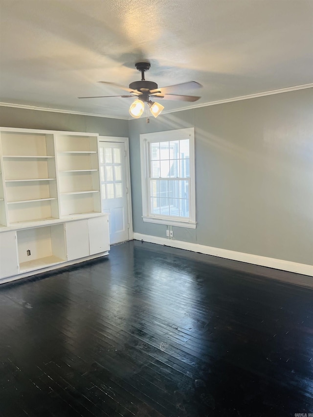 unfurnished room featuring a textured ceiling, dark hardwood / wood-style floors, ceiling fan, and ornamental molding