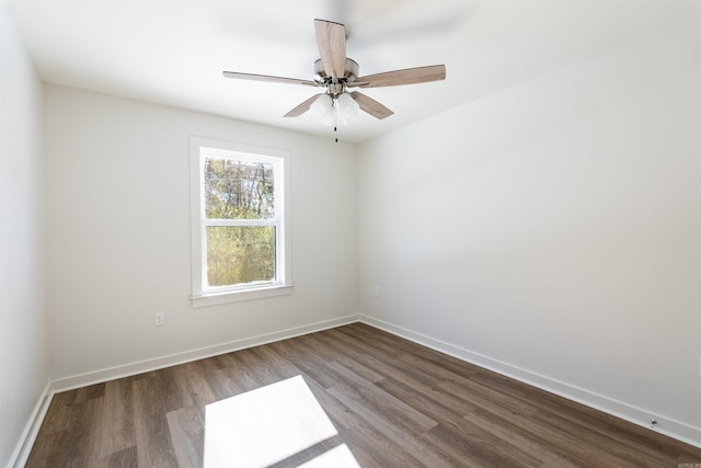 empty room featuring ceiling fan and wood-type flooring