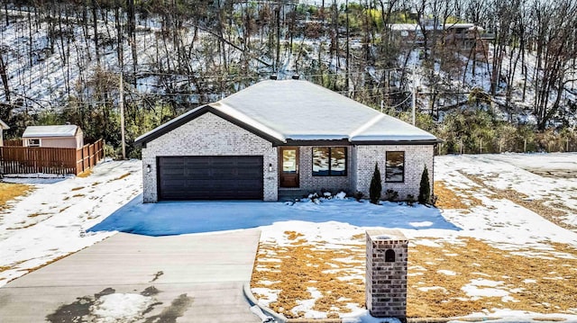 view of front of property featuring a garage