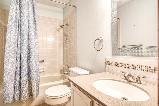 full bathroom featuring shower / tub combo, vanity, a textured ceiling, decorative backsplash, and toilet