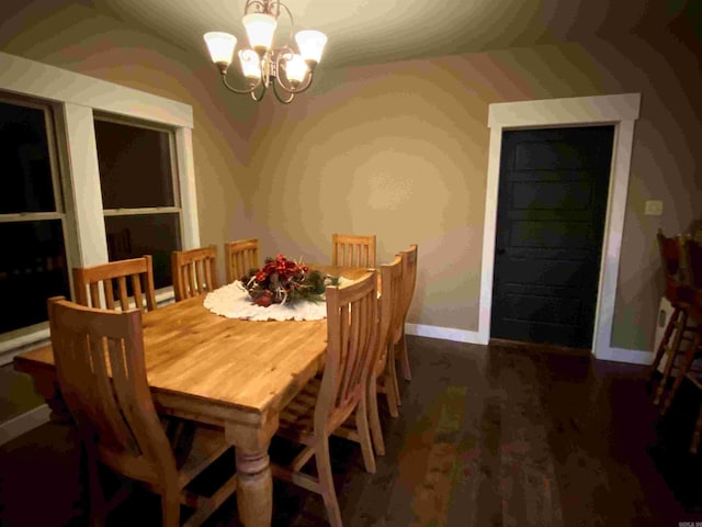 dining room featuring a chandelier