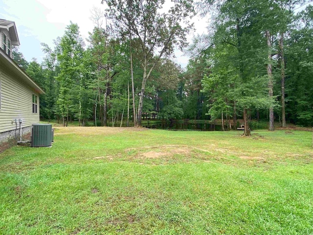 view of yard featuring central AC