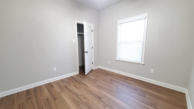 unfurnished bedroom with light hardwood / wood-style floors