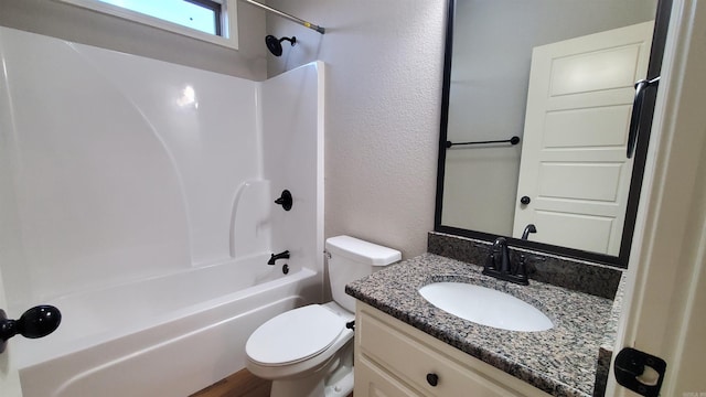 full bathroom with vanity, toilet, and shower / tub combination