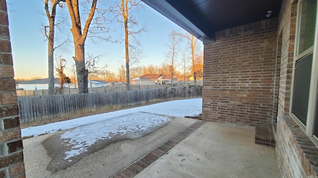 view of snow covered patio