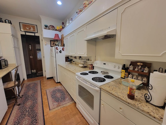 kitchen with white appliances, premium range hood, light parquet floors, crown molding, and light stone counters