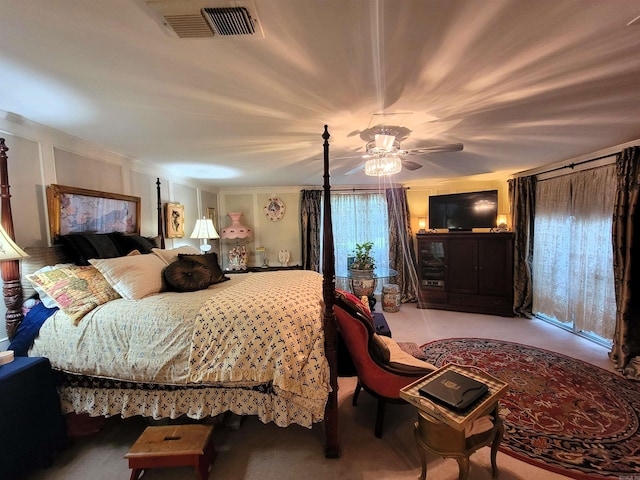 carpeted bedroom with ceiling fan