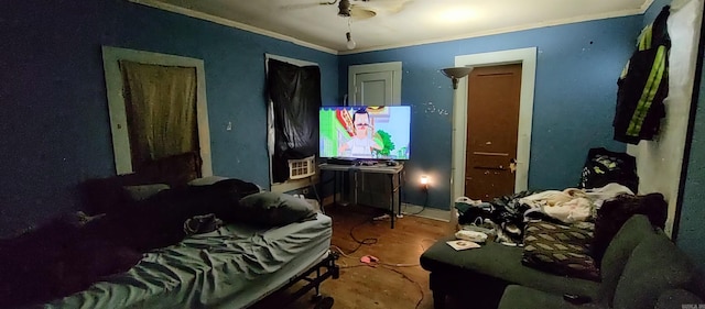 bedroom featuring ceiling fan and ornamental molding