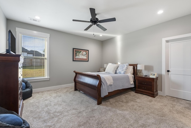 carpeted bedroom featuring ceiling fan