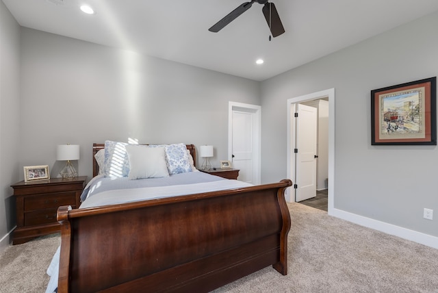 carpeted bedroom with ceiling fan