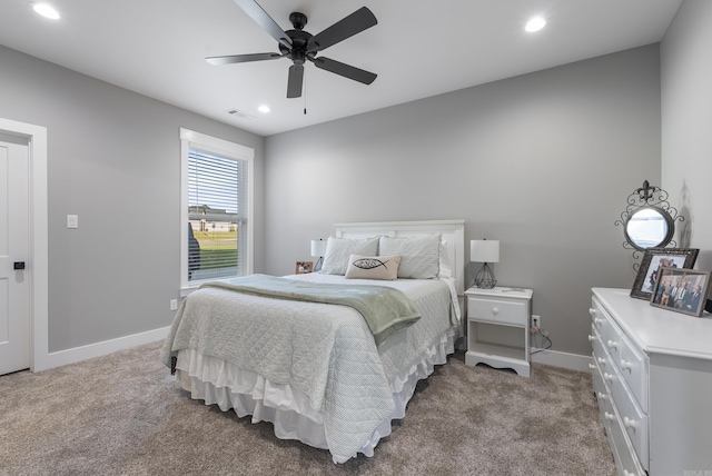 carpeted bedroom with ceiling fan