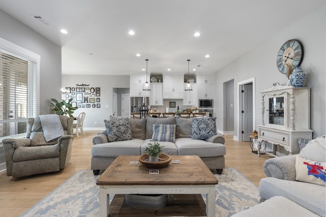 living room featuring light wood-type flooring