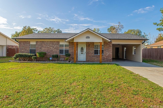 ranch-style house with a front yard and a carport