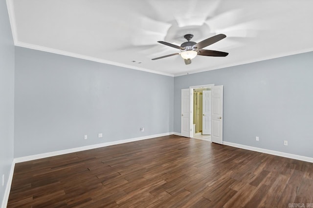 empty room with dark hardwood / wood-style flooring, ceiling fan, and ornamental molding