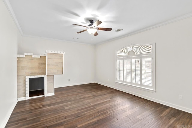 unfurnished living room with dark hardwood / wood-style floors, ceiling fan, ornamental molding, and a tile fireplace