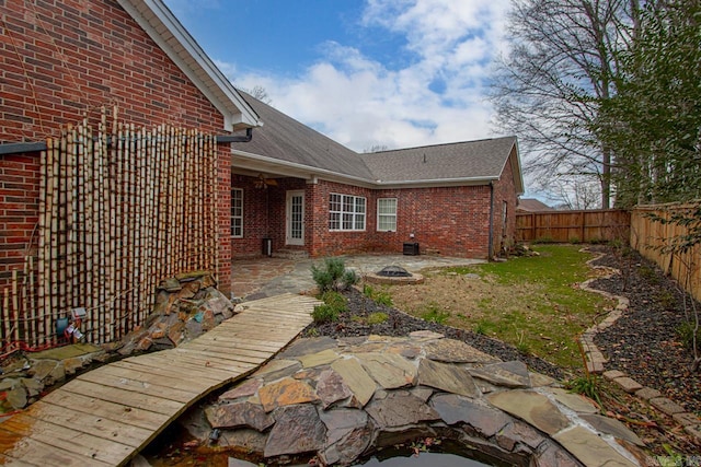 rear view of property featuring a patio