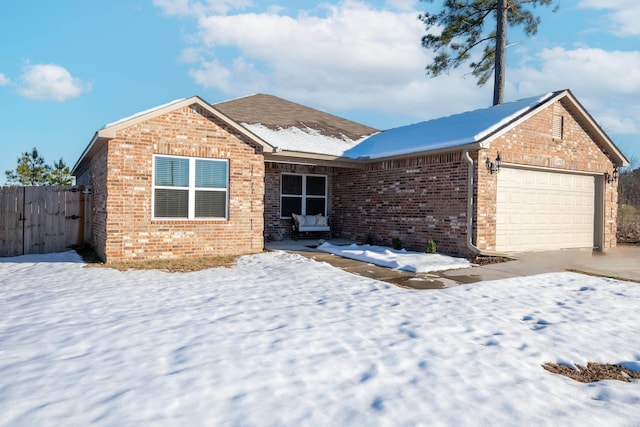 ranch-style house featuring a garage