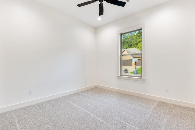 unfurnished room with carpet floors and ceiling fan