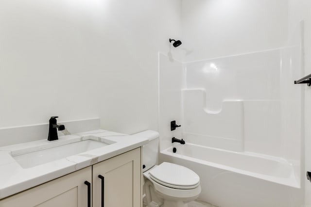 full bathroom with shower / bathing tub combination, vanity, and toilet