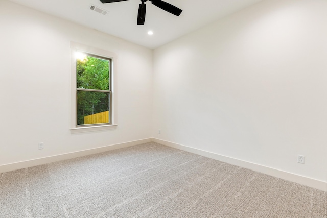 carpeted empty room with ceiling fan