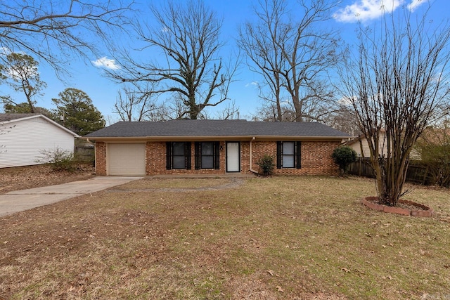 single story home featuring a front yard and a garage