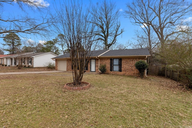 single story home featuring a front yard and a garage