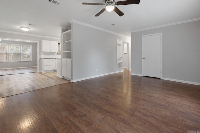 unfurnished living room with ceiling fan, dark hardwood / wood-style flooring, and ornamental molding