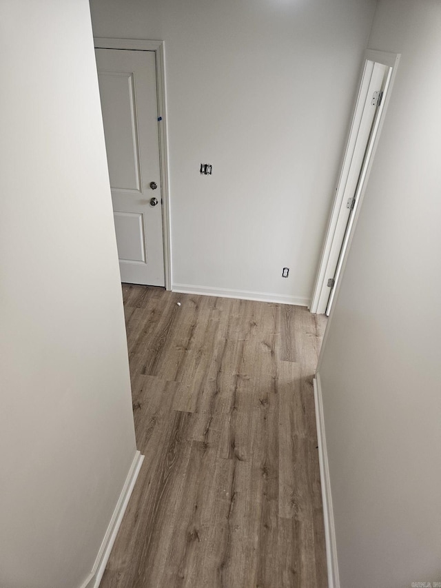 hallway featuring light wood-type flooring