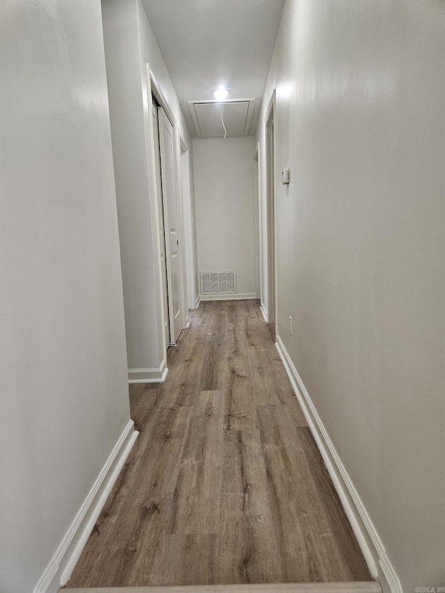 hall featuring hardwood / wood-style flooring