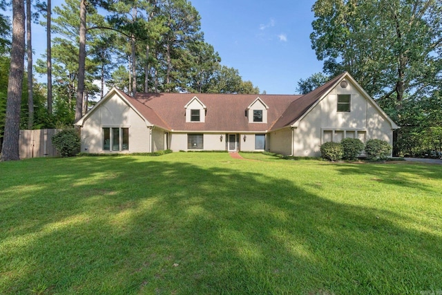 back of house with a yard