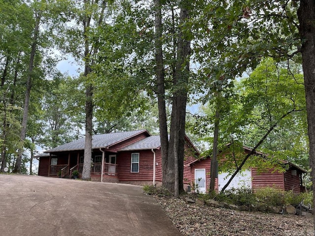 view of front of home featuring a garage and covered porch