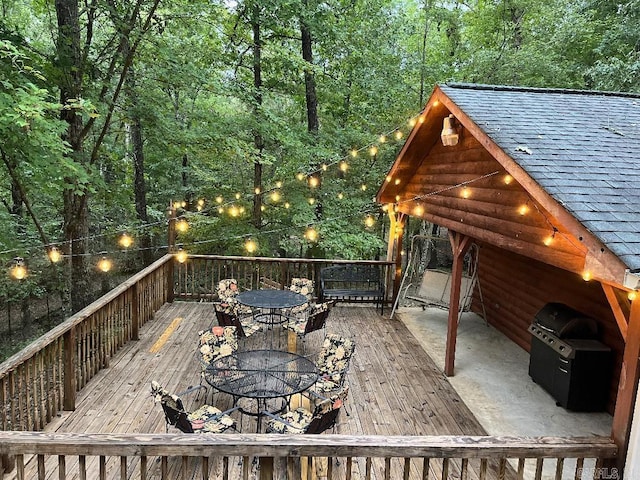 wooden deck with area for grilling