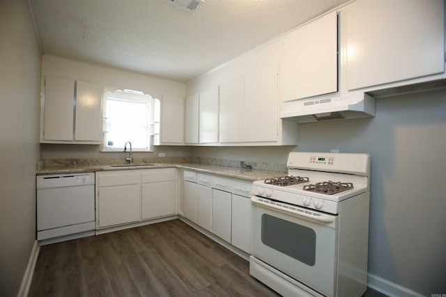 kitchen featuring white cabinets, white appliances, sink, and a textured ceiling