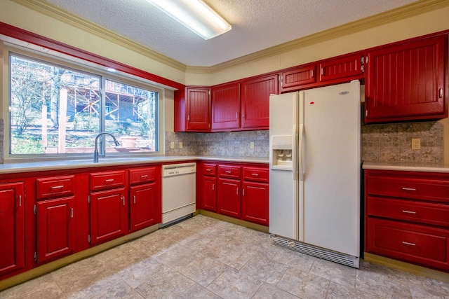 kitchen featuring decorative backsplash, a textured ceiling, white appliances, crown molding, and sink