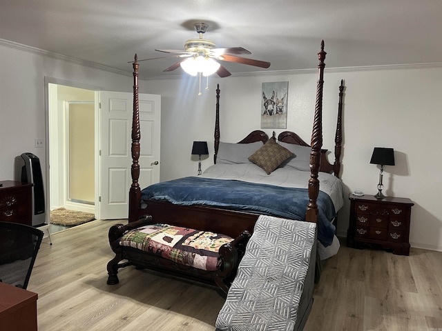 bedroom featuring ornamental molding, ceiling fan, and light hardwood / wood-style flooring