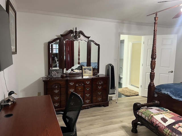 bedroom with crown molding, light hardwood / wood-style floors, and ceiling fan