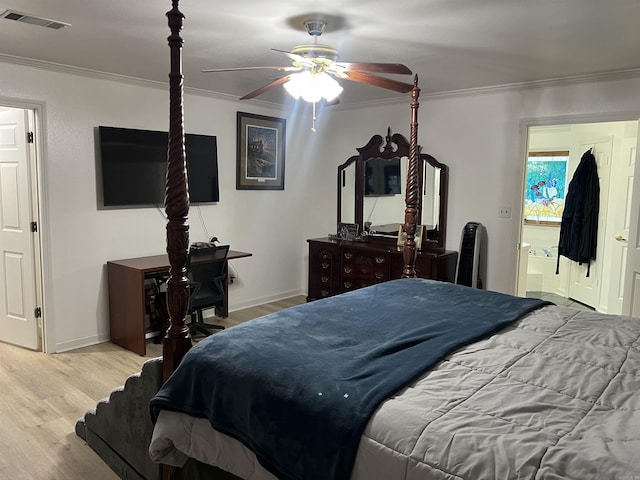 bedroom with crown molding, hardwood / wood-style floors, and ceiling fan