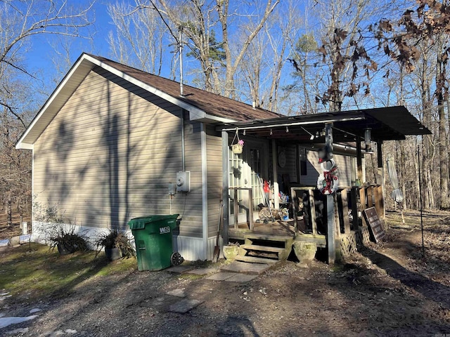 view of home's exterior with a porch