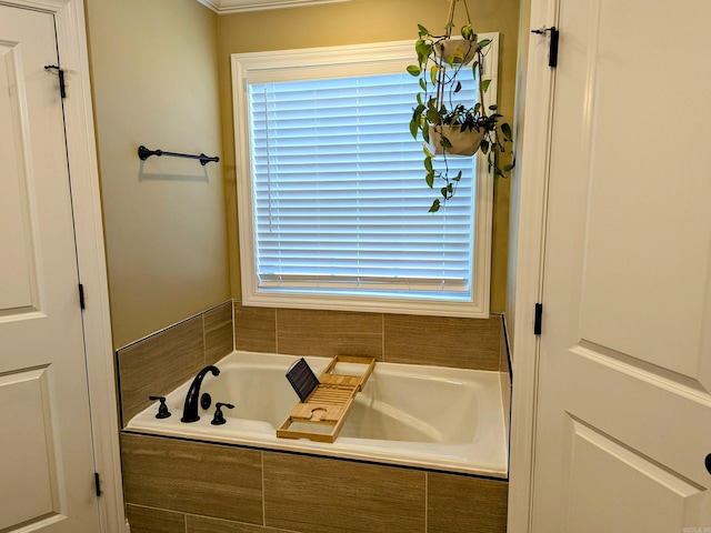 bathroom with tiled bath