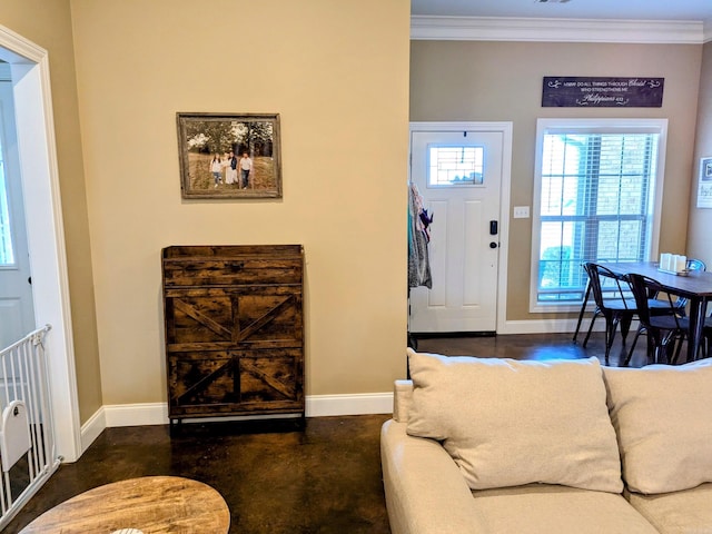 foyer featuring ornamental molding