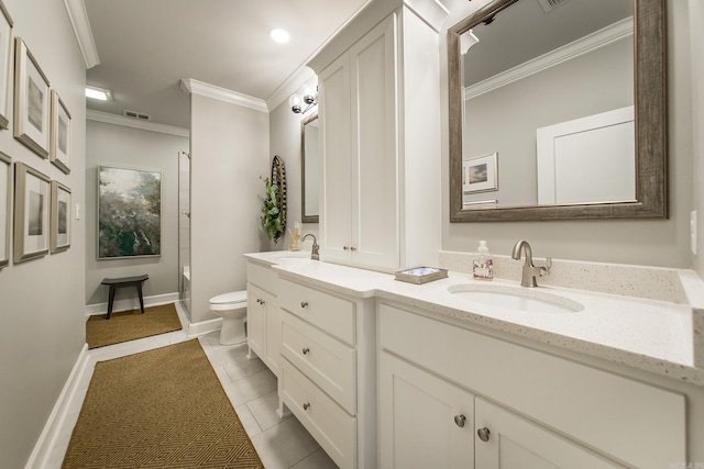 bathroom featuring toilet, vanity, tile patterned floors, and ornamental molding